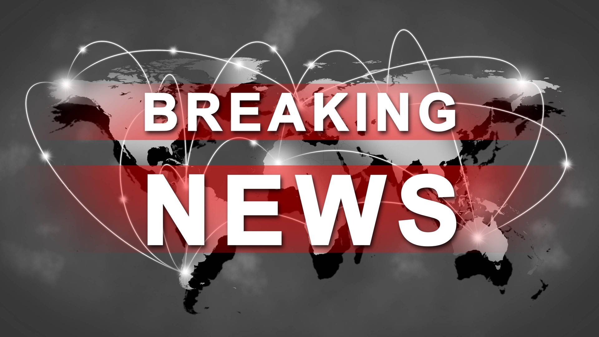 BREAKING NEWS lettering in front of world map background with stylized global connecting lines